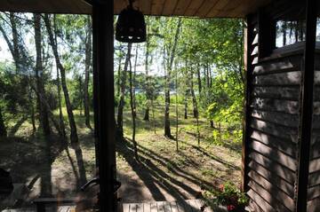 Фото Лоджи Cozy remote cabin on a lakeshore г. Kučiūnai 4