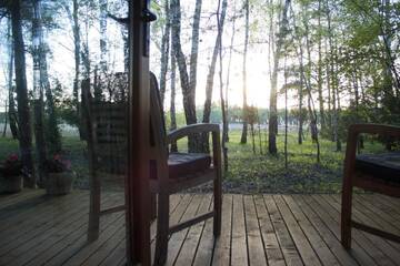 Фото номера Семейный номер с террасой Лоджи Cozy remote cabin on a lakeshore г. Kučiūnai 4